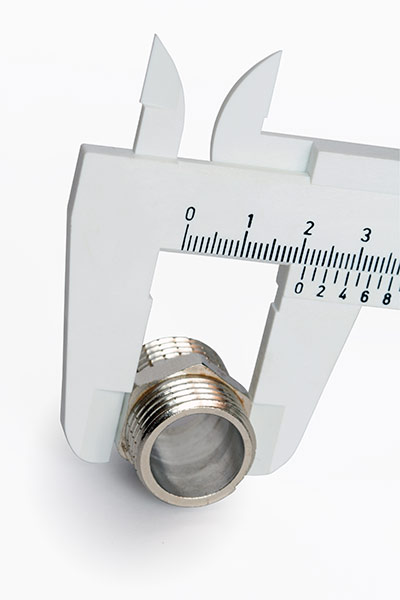 Figure 5. Calipers are the best tool for measuring the OD of a male fitting at the last thread, or the ID of a female fitting at the first thread.