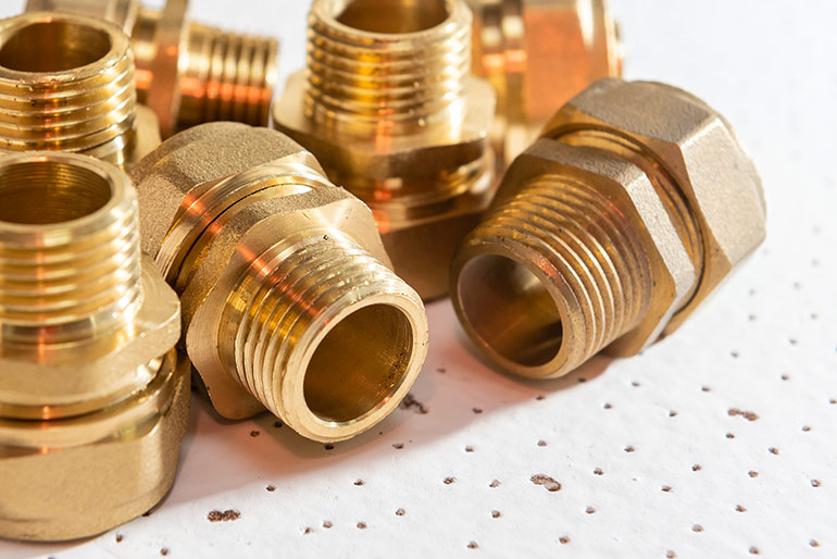 brass fluid power fittings AdobeStock_487498399